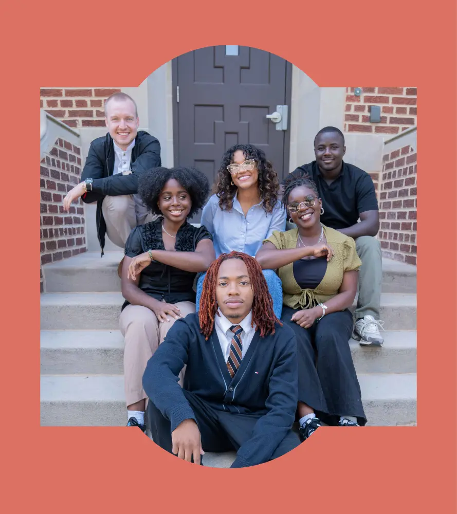 Young, african american  woman smiling immediately after being baptized at The District Church.